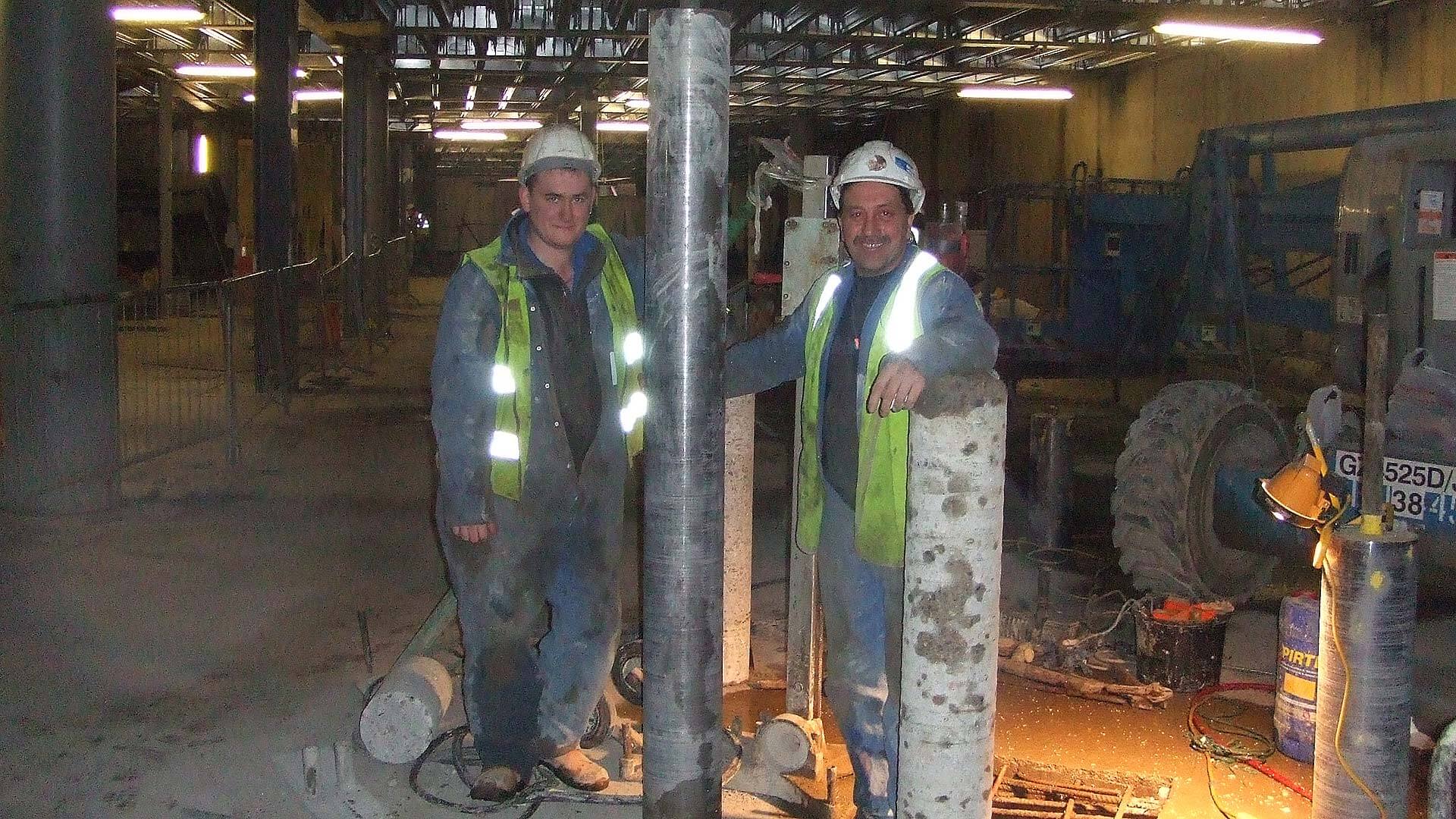 Diamond Drilling London - Diacutt operatives with Diamond Drilled Core through steel reinforced concrete